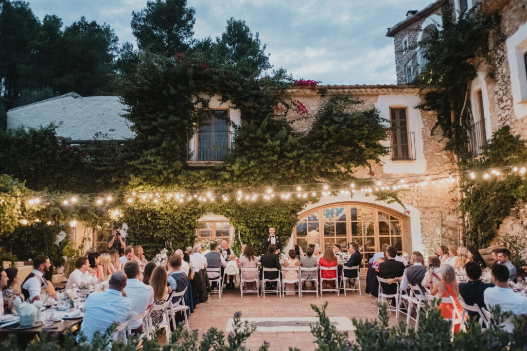 Outdoor wedding dinner in the courtyard at Almiral de la Font near Sitges