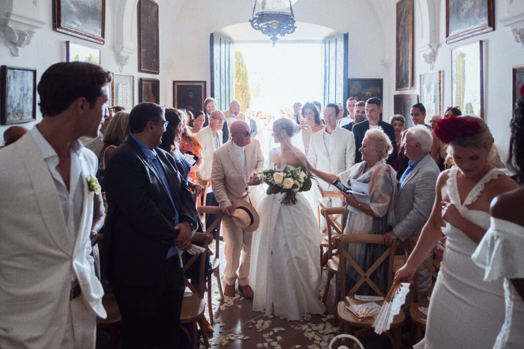 entrance of the bride during ceremony at El Convent Blanes wedding