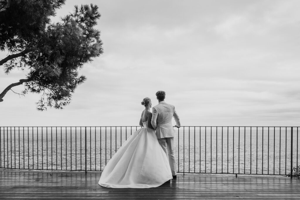 Black and white portrait of couple on terrace at El Convent Blanes