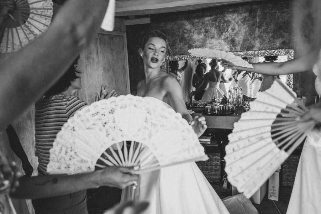 Bride getting ready inside room at El Convent Blanes