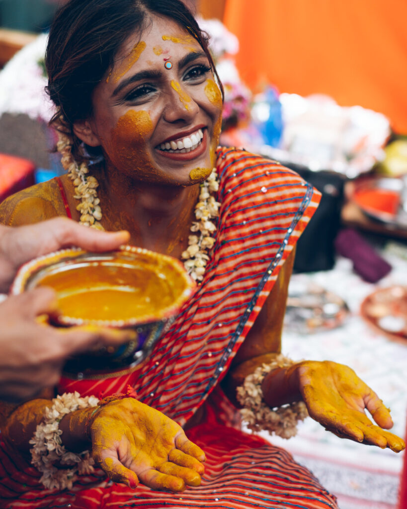 Bride during the haldi ceremony at an Indian wedding in Hampshire
