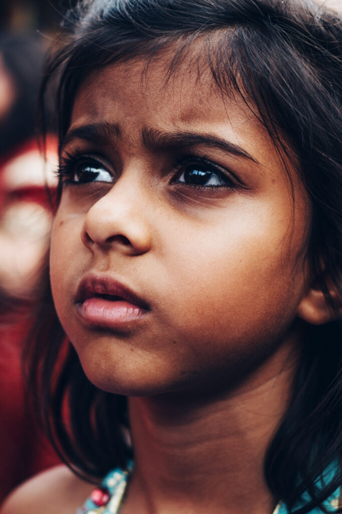 portrait of a child during an Indian wedding
