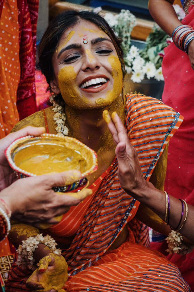 Bride during the haldi ceremony, Indian wedding photography in Hampshire