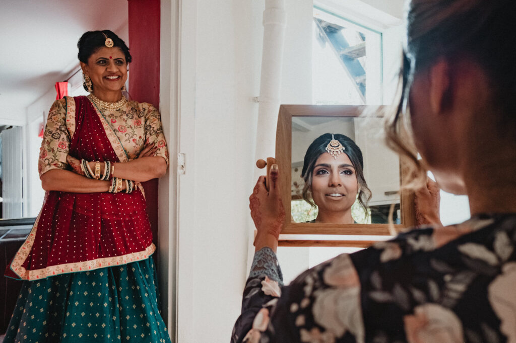 Bride getting ready before her Indian wedding