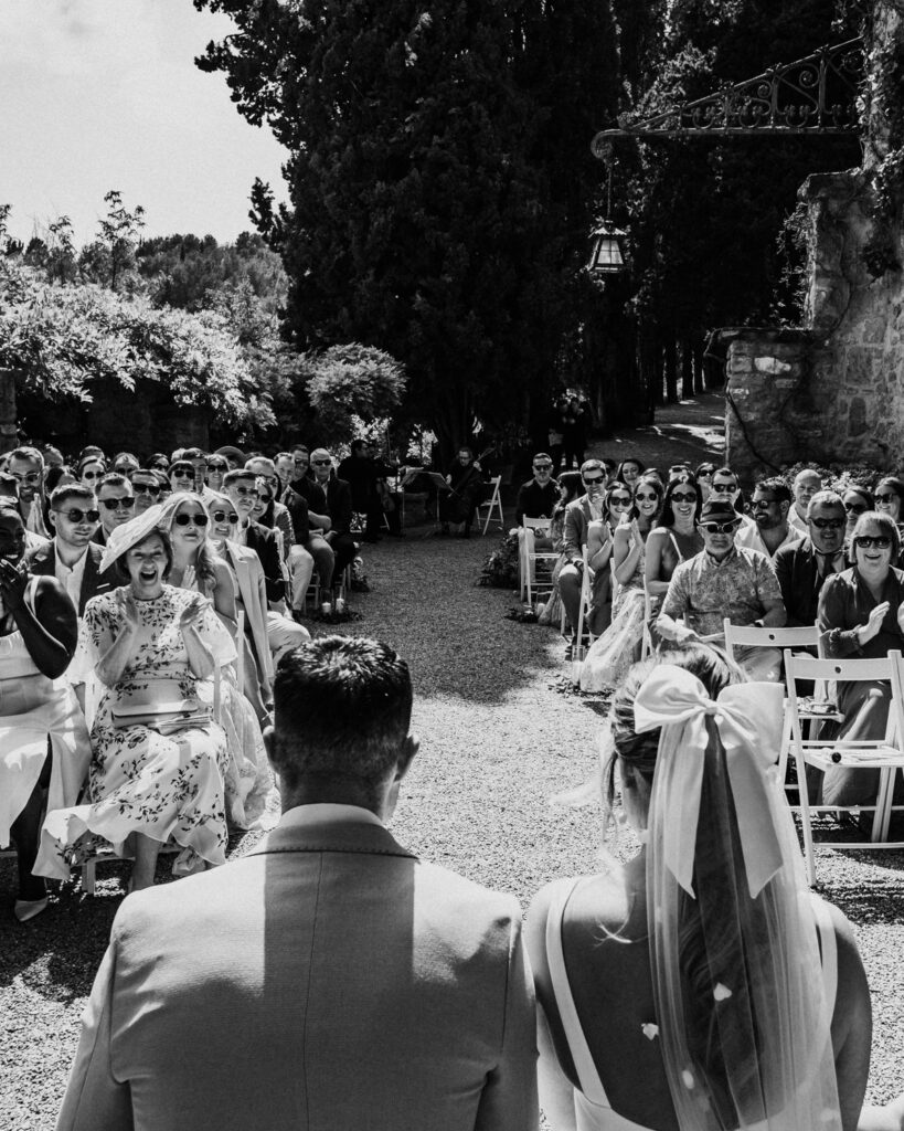 Guests seated during ceremony at La Baronia Barcelona wedding venue