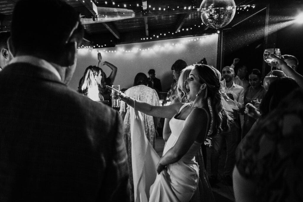 Guests dancing during evening reception at La Baronia