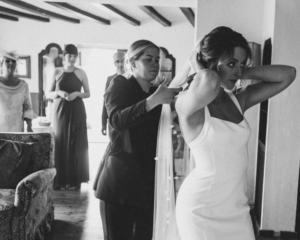 Bride getting ready inside La Baronia with natural window light