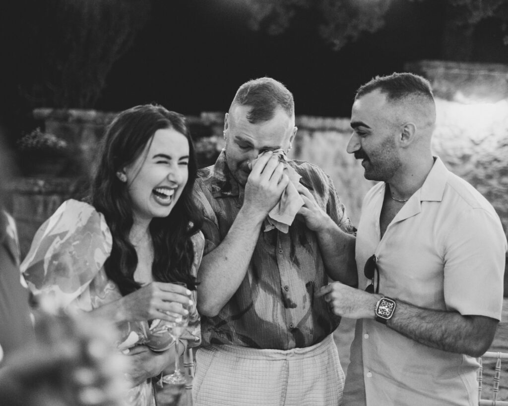 Guests emotions during dinner at La Baronia wedding reception