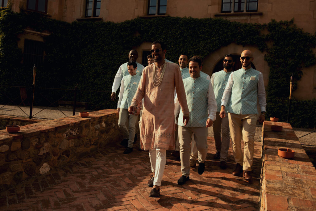 Groom arriving with family at Indian wedding Barcelona