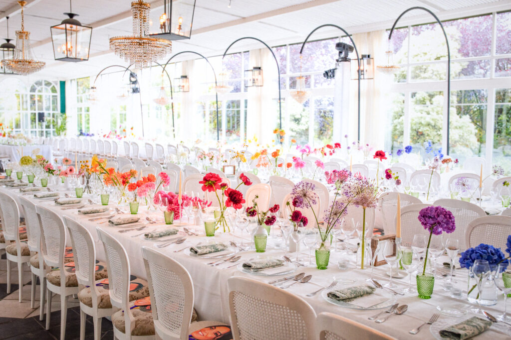 Reception table setup inside Castell de Sant Marsal pavilion