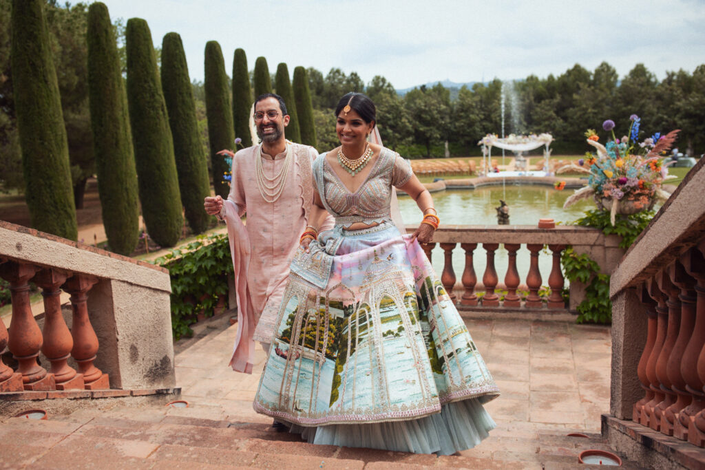 Couple running through the terrace after the ceremony Barcelona