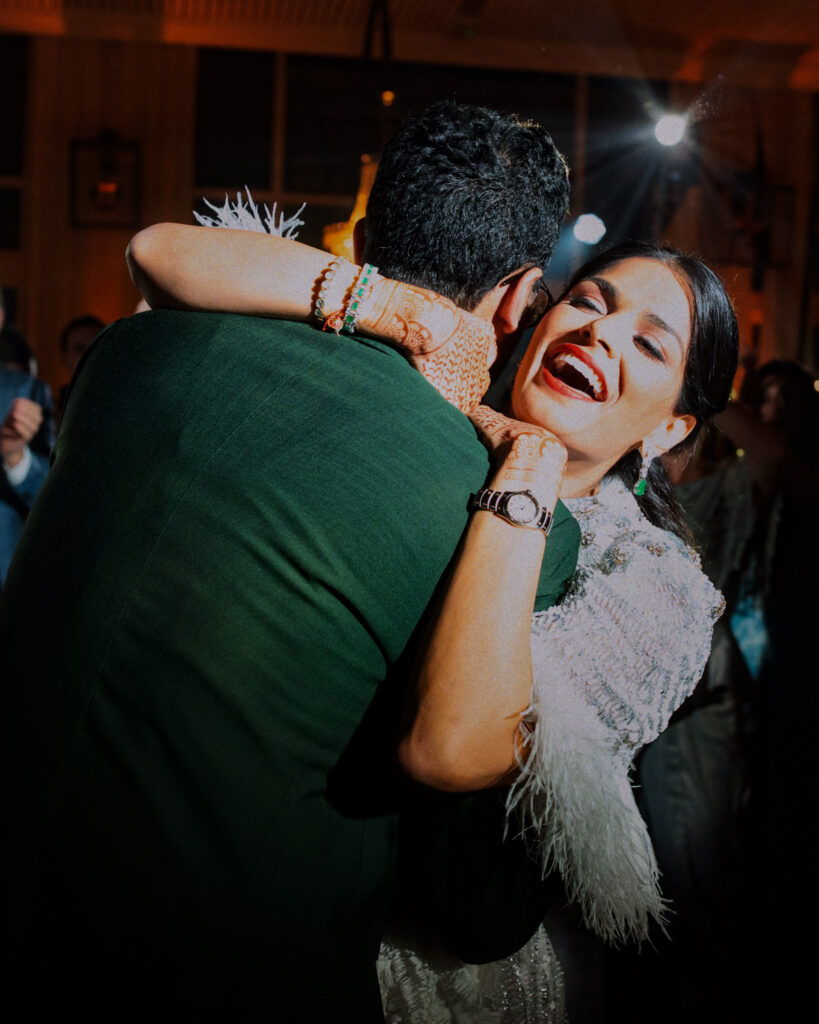 Couple celebrating on the dance floor at Indian wedding Barcelona